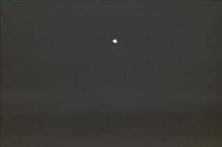 Mir Space Station as viewed from a great distance on Discover.